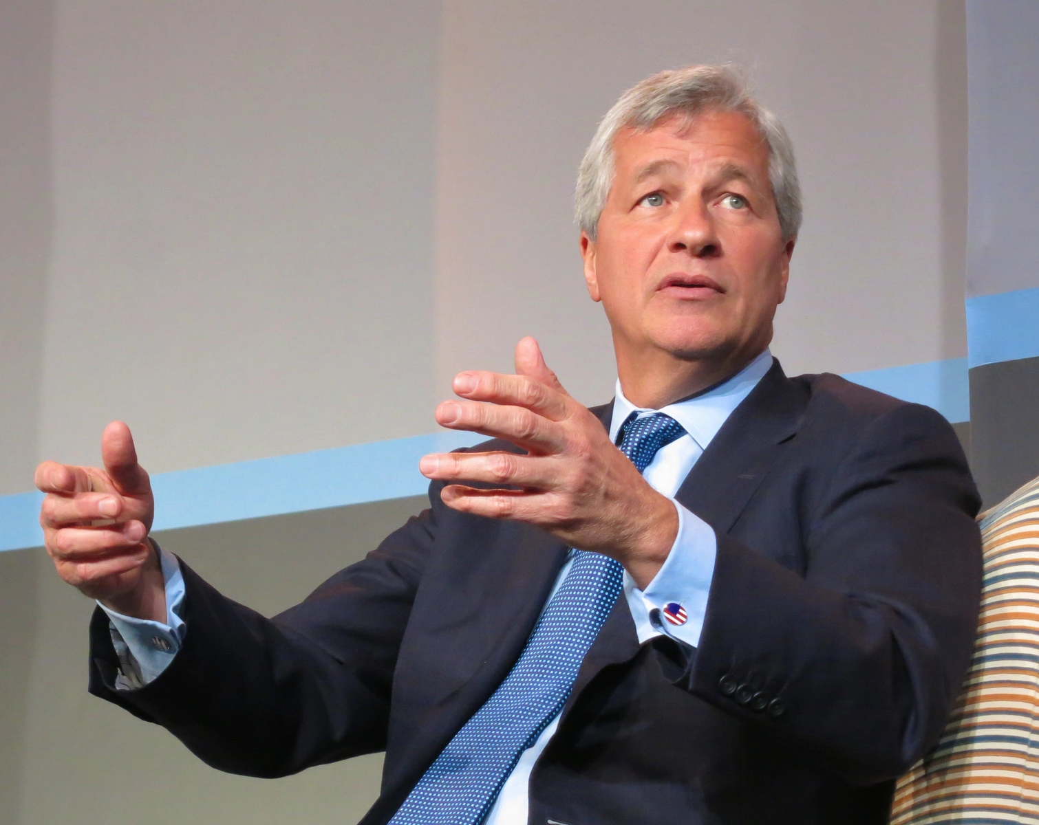 A White House crypto adviser just publicly rejected Jamie Dimon's push to regulate yield-bearing stablecoins like traditional banks.