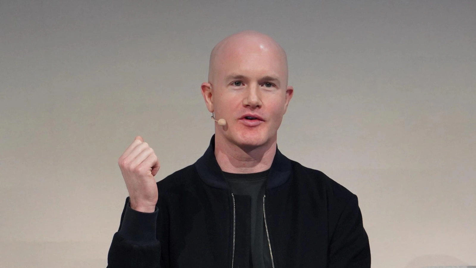 Coinbase cut 14% of its staff, citing AI adoption reshaping how crypto companies operate.