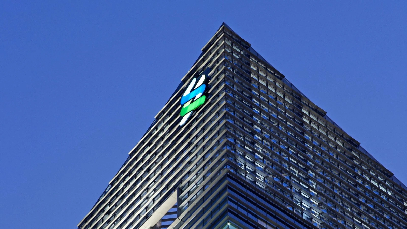 Standard Chartered took a stake in crypto market maker GSR at a $1 billion valuation, expanding its institutional crypto footprint.